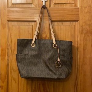 Used original Michael Kors brown purse.